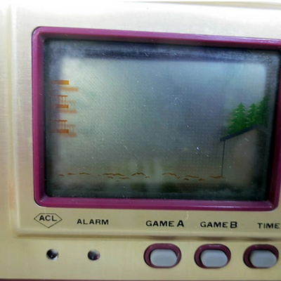 Nintendo Game & Watch Helmet CN-07 (1981) Gold Series – Complete in Box – Vintage Handheld